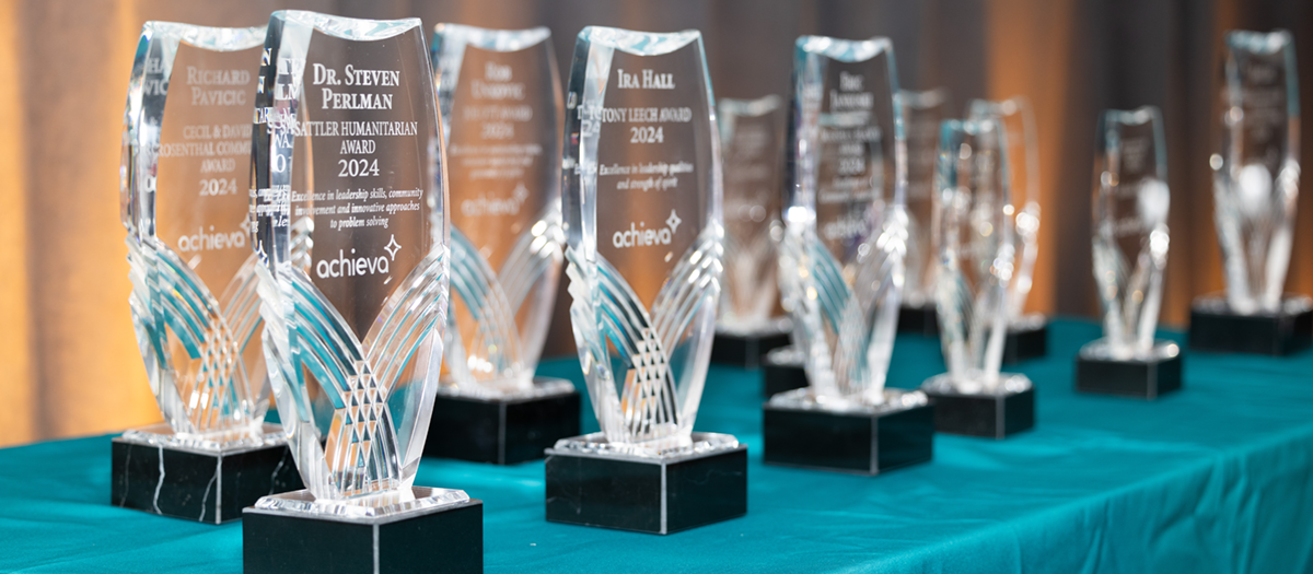 Clear acrylic awards set on a table