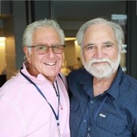 Steve Perlman and Rick Rader pose together